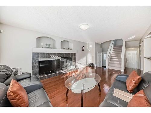 316 Panora Close Nw, Calgary, AB - Indoor Photo Showing Living Room With Fireplace