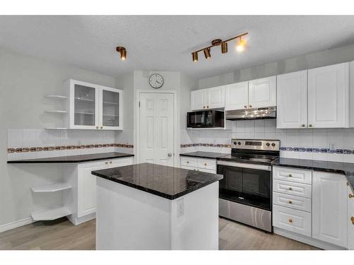 319 Sierra Nevada Place Sw, Calgary, AB - Indoor Photo Showing Kitchen