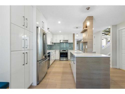 84 Woodmeadow Close Sw, Calgary, AB - Indoor Photo Showing Kitchen With Stainless Steel Kitchen With Upgraded Kitchen