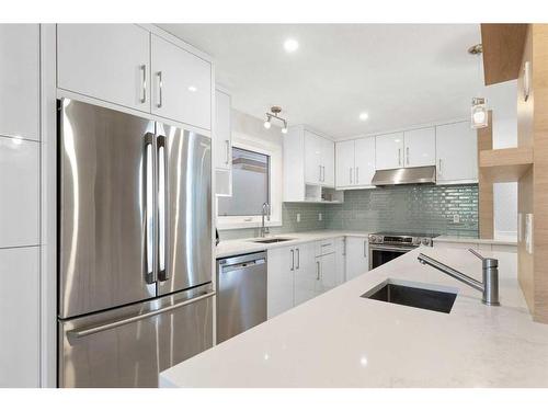 84 Woodmeadow Close Sw, Calgary, AB - Indoor Photo Showing Kitchen With Stainless Steel Kitchen With Upgraded Kitchen