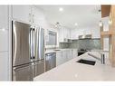 84 Woodmeadow Close Sw, Calgary, AB  - Indoor Photo Showing Kitchen With Stainless Steel Kitchen With Upgraded Kitchen 