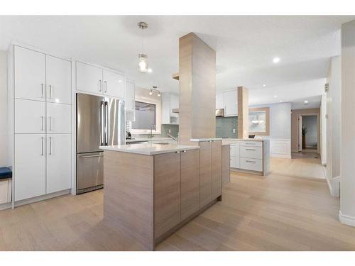 84 Woodmeadow Close Sw, Calgary, AB - Indoor Photo Showing Kitchen With Stainless Steel Kitchen With Upgraded Kitchen