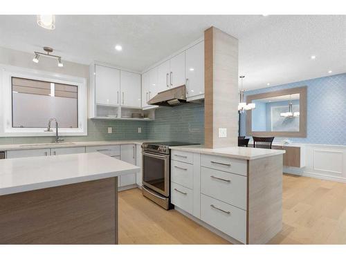 84 Woodmeadow Close Sw, Calgary, AB - Indoor Photo Showing Kitchen With Upgraded Kitchen