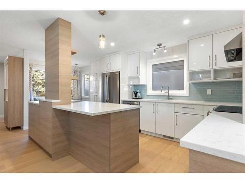 84 Woodmeadow Close Sw, Calgary, AB - Indoor Photo Showing Kitchen With Upgraded Kitchen