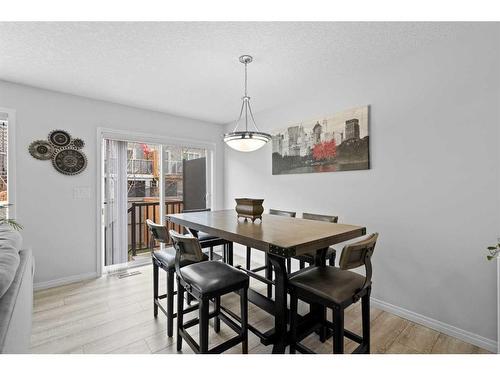 345 Hillcrest Square Sw, Airdrie, AB - Indoor Photo Showing Dining Room