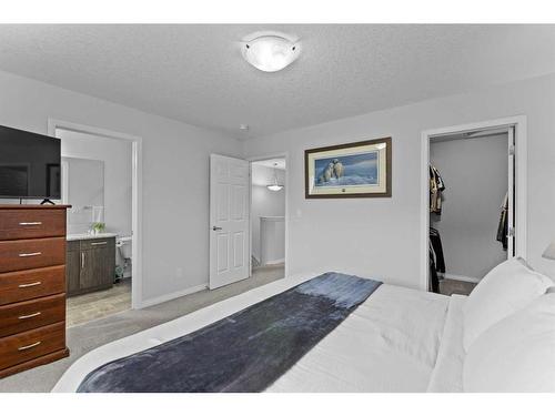 345 Hillcrest Square Sw, Airdrie, AB - Indoor Photo Showing Bedroom