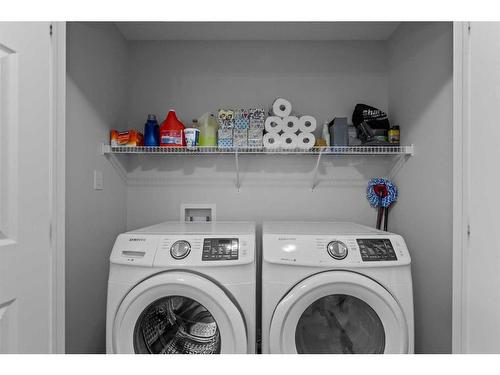 345 Hillcrest Square Sw, Airdrie, AB - Indoor Photo Showing Laundry Room