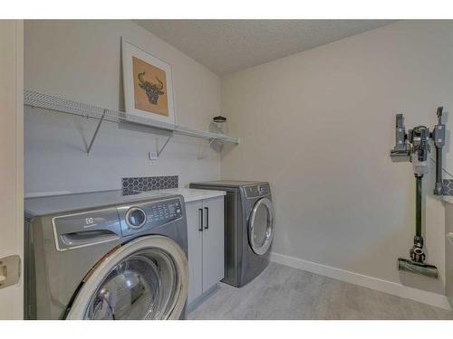 99 Legacy Glen Terrace Se, Calgary, AB - Indoor Photo Showing Laundry Room