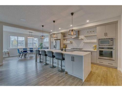 99 Legacy Glen Terrace Se, Calgary, AB - Indoor Photo Showing Kitchen With Stainless Steel Kitchen With Upgraded Kitchen