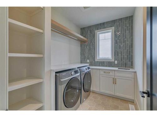 703 Green Haven Place, Rural Foothills County, AB - Indoor Photo Showing Laundry Room