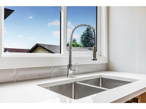 6740 Temple Drive Ne, Calgary, AB - Indoor Photo Showing Kitchen With Double Sink