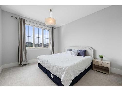 80 Coulee Way Sw, Calgary, AB - Indoor Photo Showing Bedroom