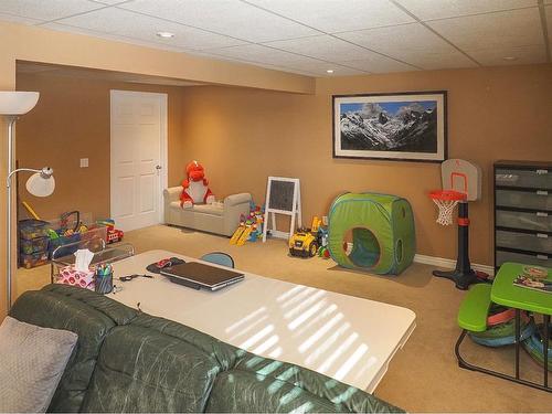 1105-720 Willowbrook Road Nw, Airdrie, AB - Indoor Photo Showing Other Room