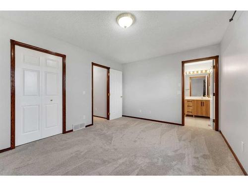 183 Coral Spings Circle Ne, Calgary, AB - Indoor Photo Showing Other Room