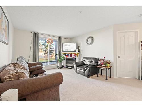 2112-2280 68 Street Ne, Calgary, AB - Indoor Photo Showing Living Room