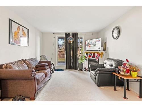 2112-2280 68 Street Ne, Calgary, AB - Indoor Photo Showing Living Room