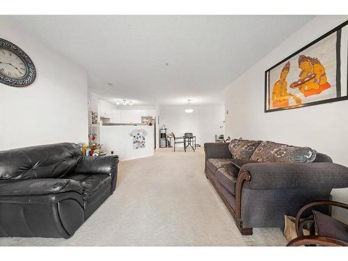 2112-2280 68 Street Ne, Calgary, AB - Indoor Photo Showing Living Room