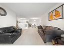 2112-2280 68 Street Ne, Calgary, AB  - Indoor Photo Showing Living Room 