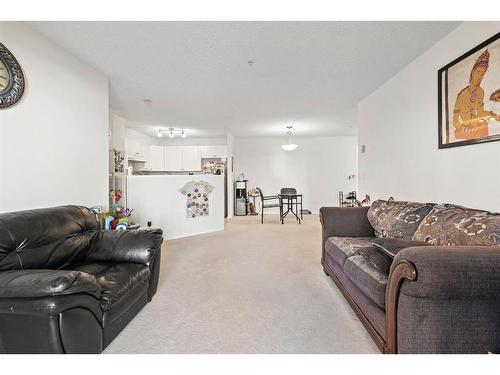 2112-2280 68 Street Ne, Calgary, AB - Indoor Photo Showing Living Room