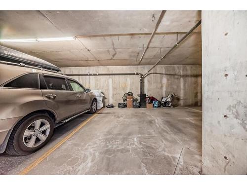 2214-211 Aspen Stone Boulevard Sw, Calgary, AB - Indoor Photo Showing Garage