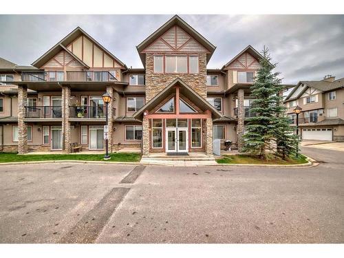 2214-211 Aspen Stone Boulevard Sw, Calgary, AB - Outdoor With Balcony With Facade