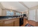 2214-211 Aspen Stone Boulevard Sw, Calgary, AB  - Indoor Photo Showing Kitchen With Double Sink 