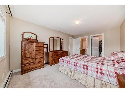 2214-211 Aspen Stone Boulevard Sw, Calgary, AB - Indoor Photo Showing Bedroom