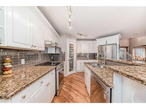 15510 Mckenzie Lake Way Se, Calgary, AB - Indoor Photo Showing Kitchen With Double Sink With Upgraded Kitchen