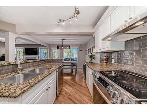 15510 Mckenzie Lake Way Se, Calgary, AB - Indoor Photo Showing Kitchen With Double Sink