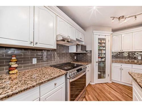 15510 Mckenzie Lake Way Se, Calgary, AB - Indoor Photo Showing Kitchen With Upgraded Kitchen