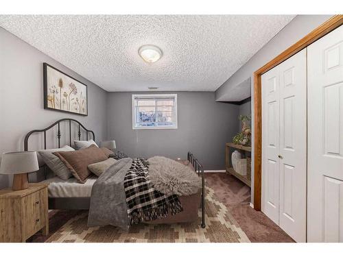 15510 Mckenzie Lake Way Se, Calgary, AB - Indoor Photo Showing Bedroom