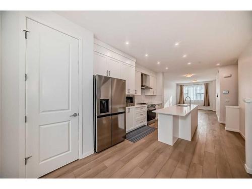 274 Aquila Drive Nw, Calgary, AB - Indoor Photo Showing Kitchen With Stainless Steel Kitchen