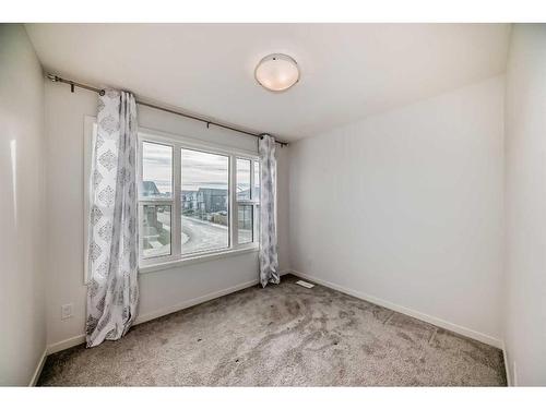 274 Aquila Drive Nw, Calgary, AB - Indoor Photo Showing Other Room