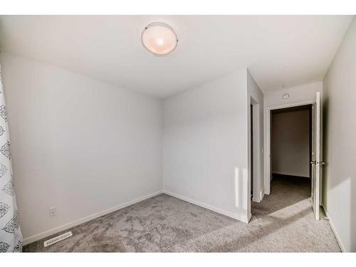 274 Aquila Drive Nw, Calgary, AB - Indoor Photo Showing Other Room