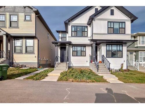 274 Aquila Drive Nw, Calgary, AB - Outdoor With Facade