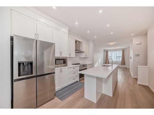 274 Aquila Drive Nw, Calgary, AB - Indoor Photo Showing Kitchen With Stainless Steel Kitchen With Upgraded Kitchen