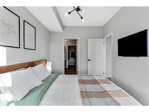 402-4150 Seton Drive Se, Calgary, AB - Indoor Photo Showing Bedroom