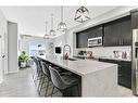 402-4150 Seton Drive Se, Calgary, AB  - Indoor Photo Showing Kitchen With Upgraded Kitchen 