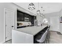 402-4150 Seton Drive Se, Calgary, AB  - Indoor Photo Showing Kitchen With Upgraded Kitchen 