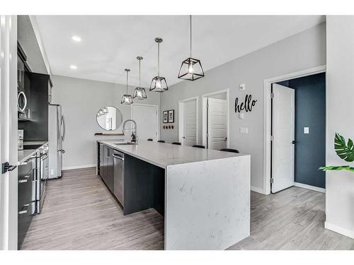 402-4150 Seton Drive Se, Calgary, AB - Indoor Photo Showing Kitchen With Upgraded Kitchen