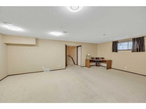 1920 New Brighton Drive Se, Calgary, AB - Indoor Photo Showing Basement