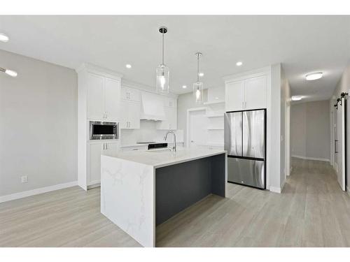 329 Copperhead Way Se, Calgary, AB - Indoor Photo Showing Kitchen With Upgraded Kitchen