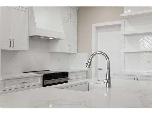 329 Copperhead Way Se, Calgary, AB - Indoor Photo Showing Kitchen With Upgraded Kitchen