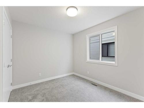 329 Copperhead Way Se, Calgary, AB - Indoor Photo Showing Other Room