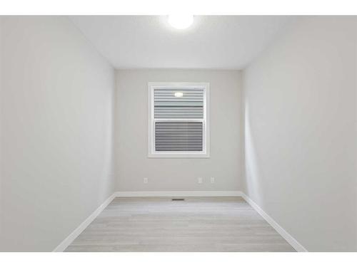 329 Copperhead Way Se, Calgary, AB - Indoor Photo Showing Other Room