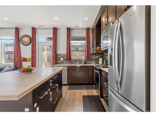 204-140 Redstone Walk Ne, Calgary, AB - Indoor Photo Showing Kitchen With Stainless Steel Kitchen With Upgraded Kitchen