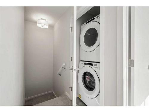 204-140 Redstone Walk Ne, Calgary, AB - Indoor Photo Showing Laundry Room