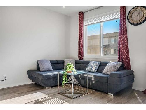 204-140 Redstone Walk Ne, Calgary, AB - Indoor Photo Showing Living Room