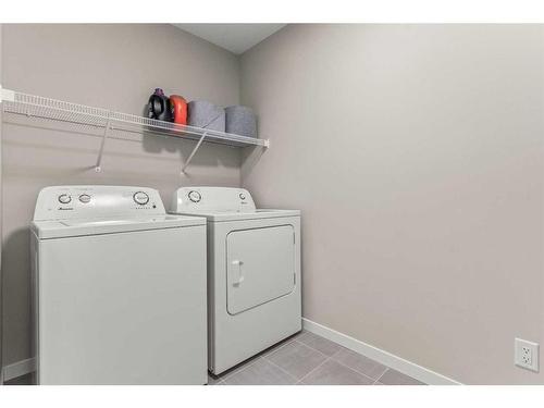 163 Masters Heights Se, Calgary, AB - Indoor Photo Showing Laundry Room