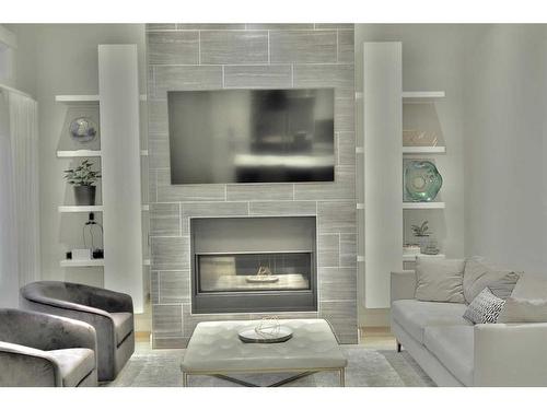 623 27 Avenue Ne, Calgary, AB - Indoor Photo Showing Living Room With Fireplace